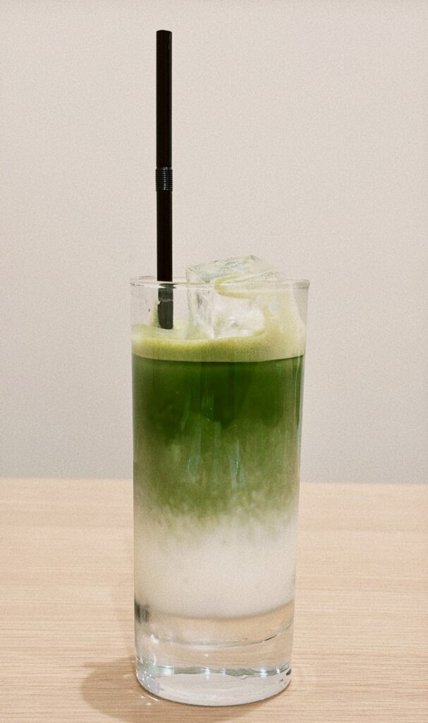 Image of matcha latte viewed from the side
